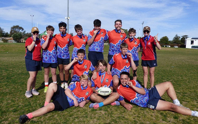 Rugby League Football team display gold medals